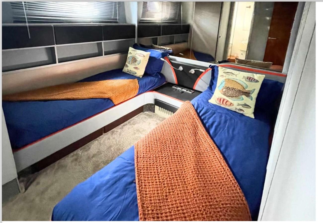 a room with bunk beds aboard SEA SEVEN Yacht for Sale