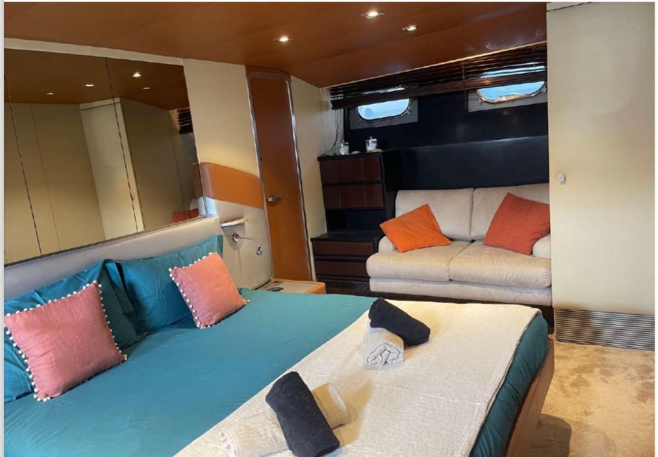 a bed with pillows and pillows aboard SEA SEVEN Yacht for Sale