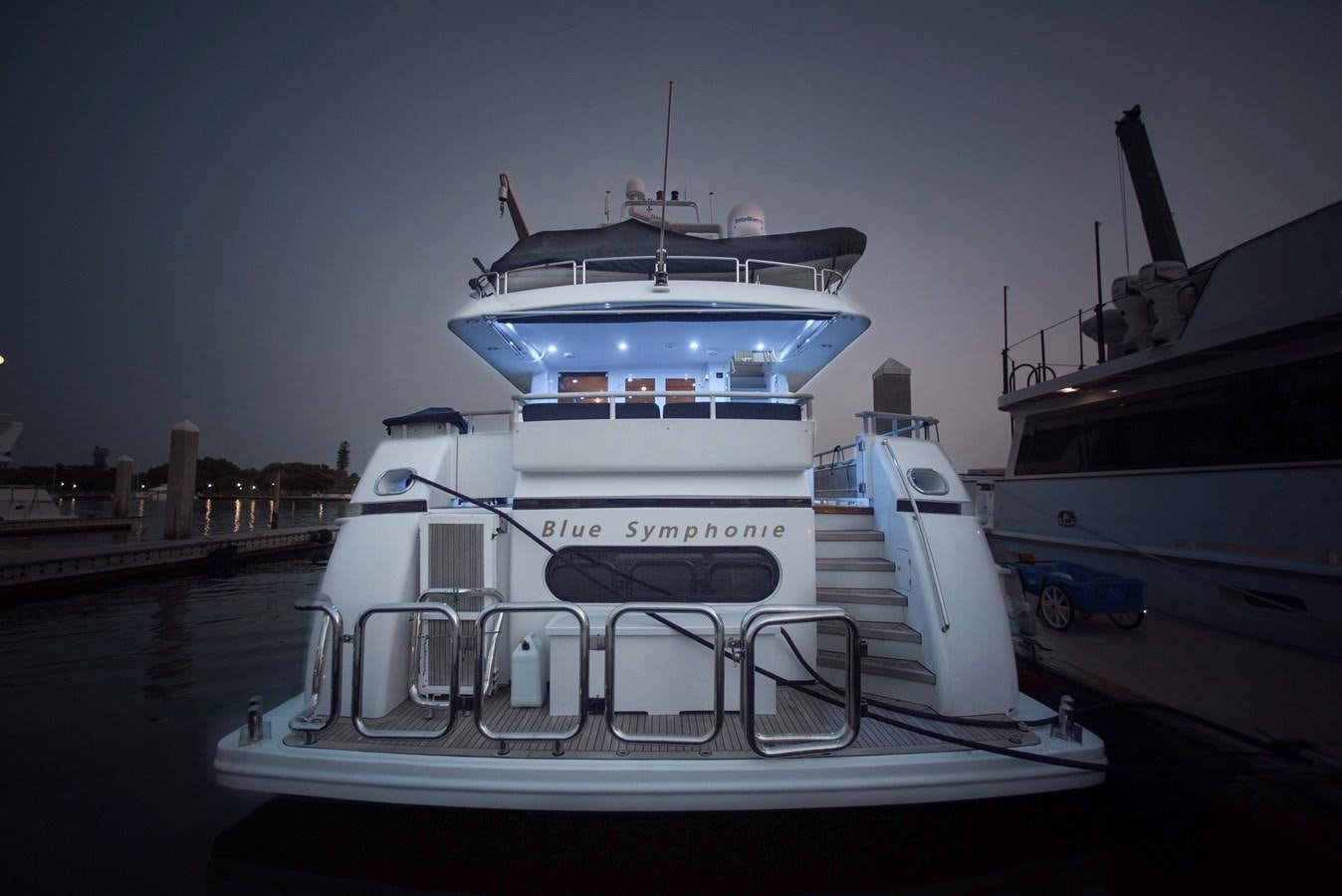 a boat docked at a pier aboard BLUE SYMPHONIE Yacht for Sale