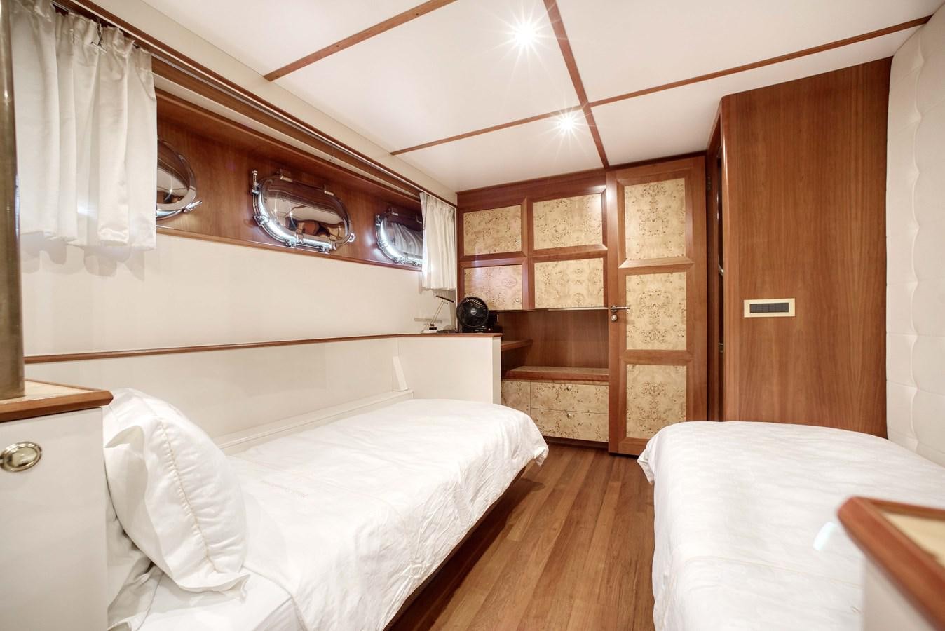 a room with two beds aboard BLUE SYMPHONIE Yacht for Sale