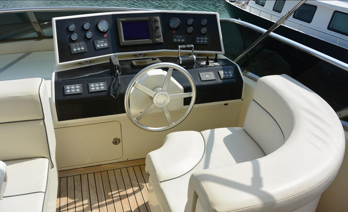 the inside of a car aboard 2008 CANADOS 76 Yacht for Sale
