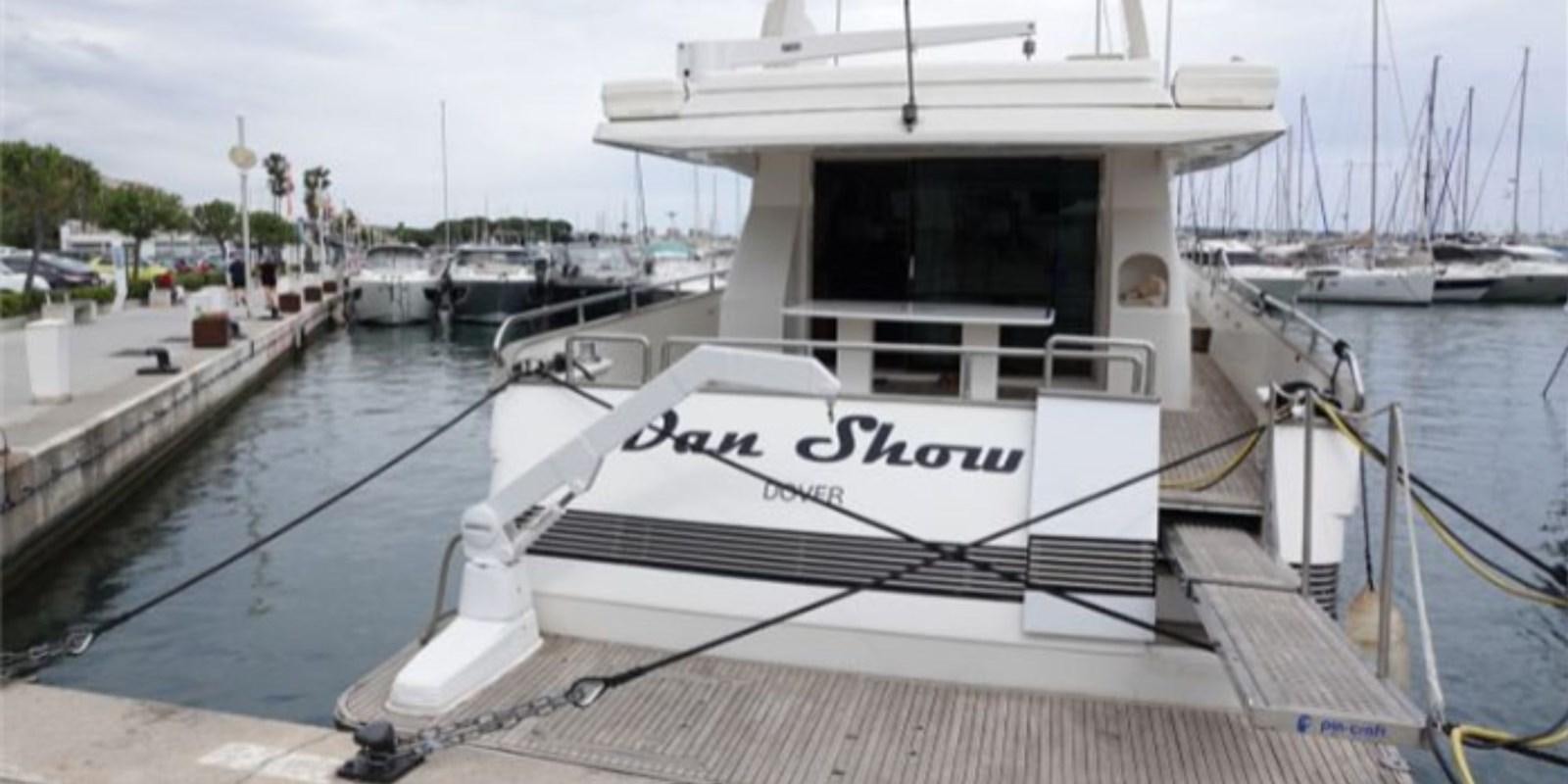 a boat docked at a pier aboard DAN SHOW Yacht for Sale