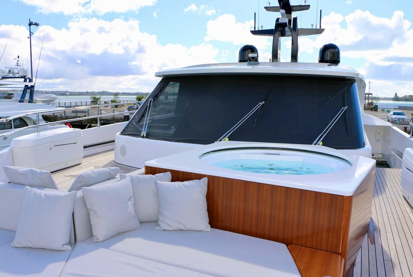 a white boat with a white roof aboard DB Yacht for Sale