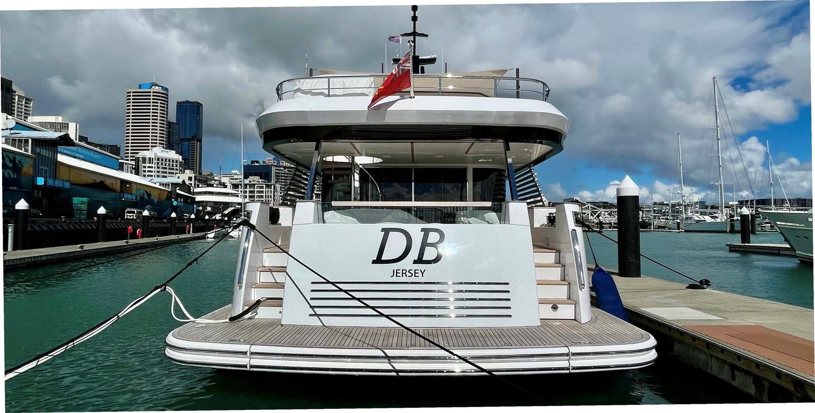 a boat docked at a pier aboard DB Yacht for Sale