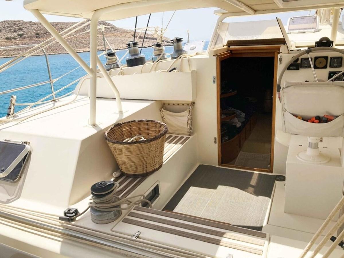 a boat with a basket and a basket on it aboard CONAN Yacht for Sale