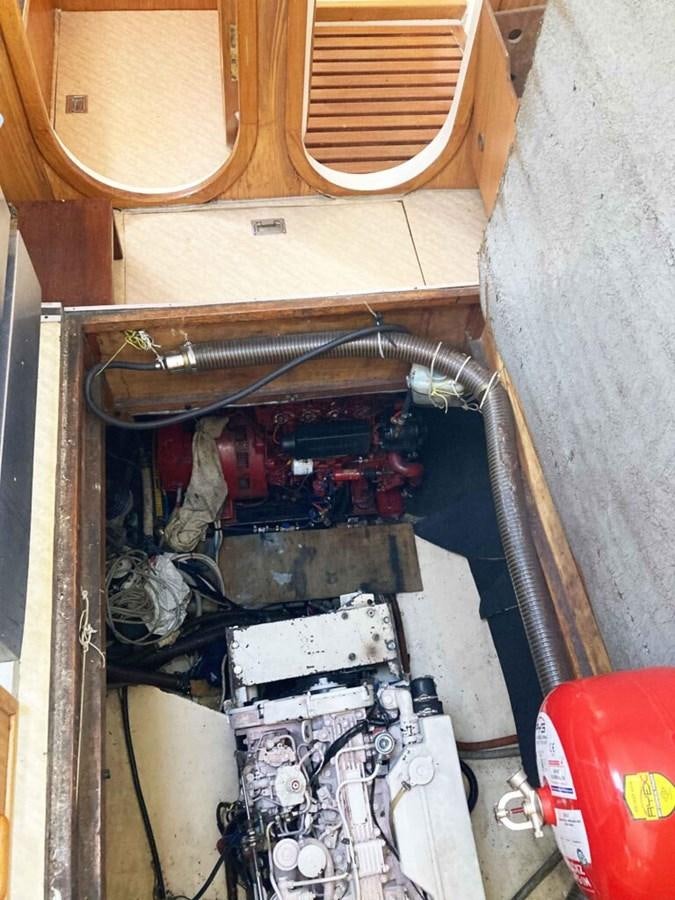 a car with a car door open aboard CONAN Yacht for Sale
