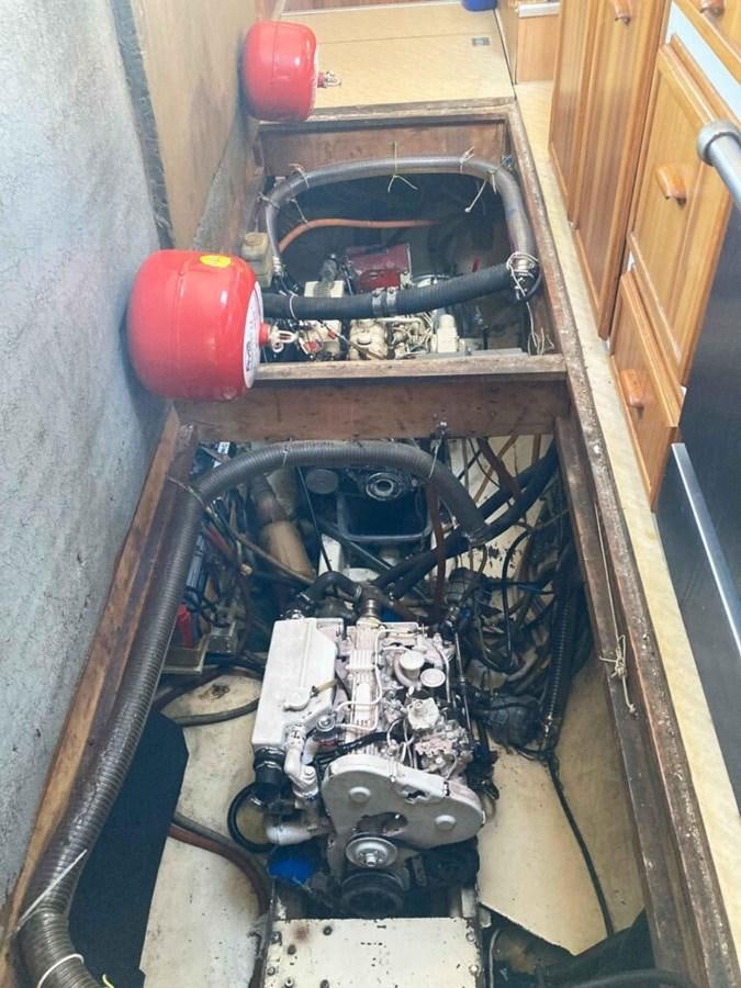 a car with a door open aboard CONAN Yacht for Sale