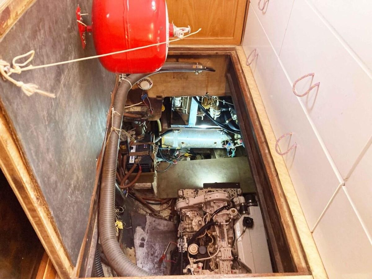 a car with a hood open aboard CONAN Yacht for Sale