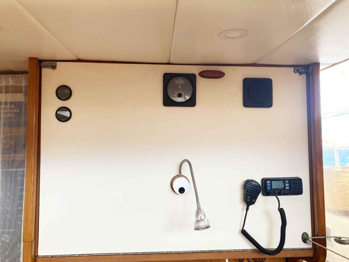 a wall with a couple of switches aboard CONAN Yacht for Sale