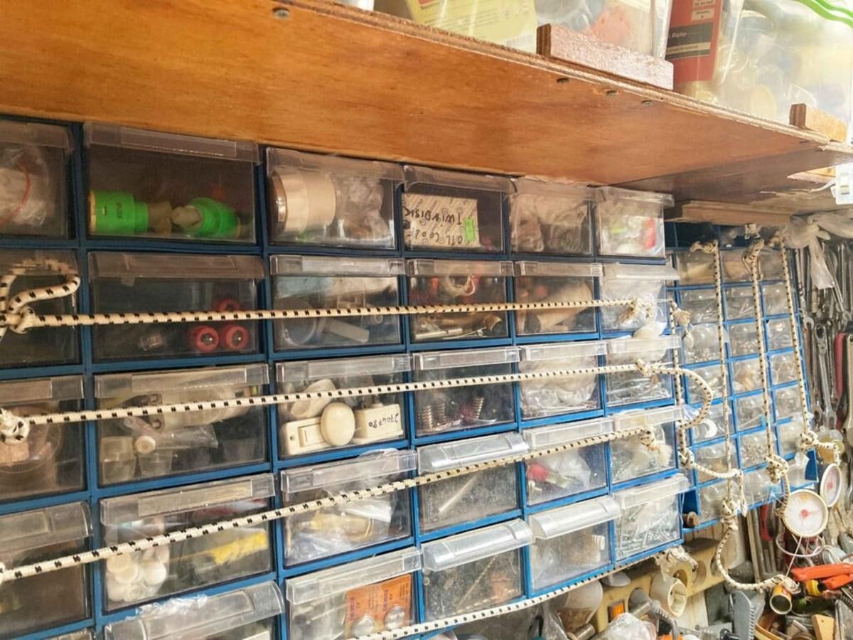 a shelf with many items on it aboard CONAN Yacht for Sale