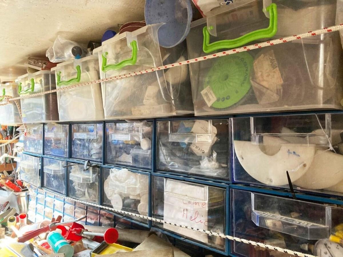 a shelf with objects on it aboard CONAN Yacht for Sale