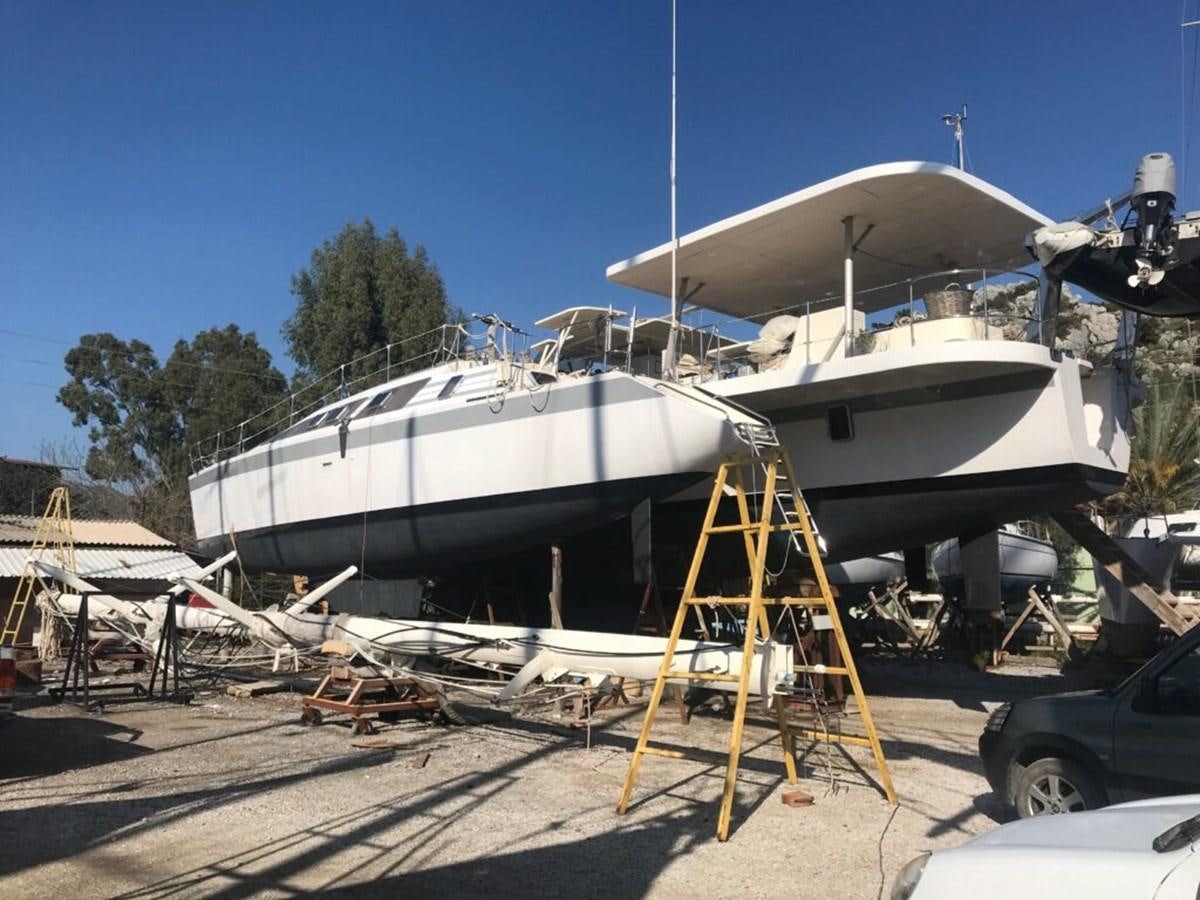 a couple of boats are parked aboard CONAN Yacht for Sale