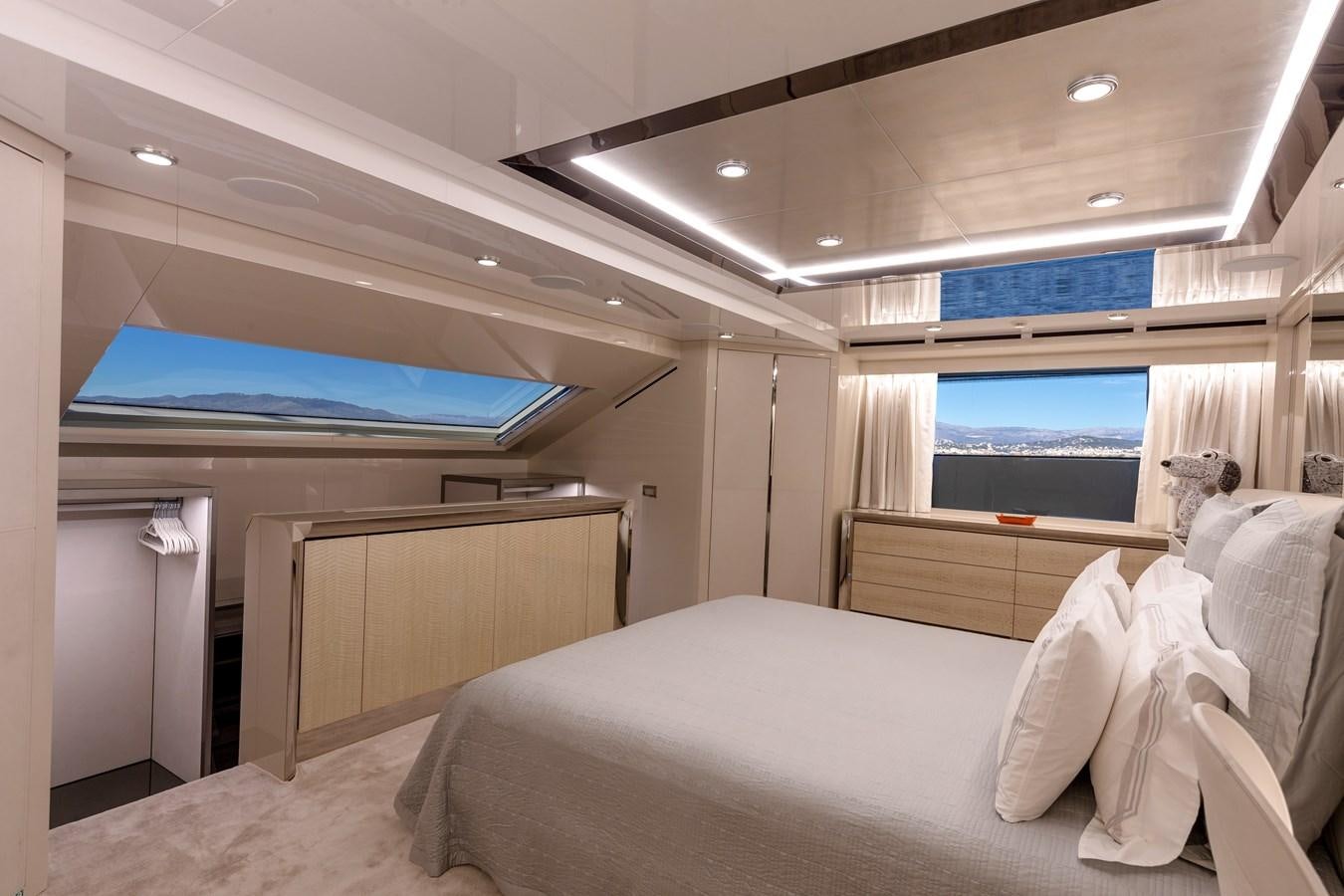 a room with a bed and a television aboard SL118 #653 Yacht for Sale