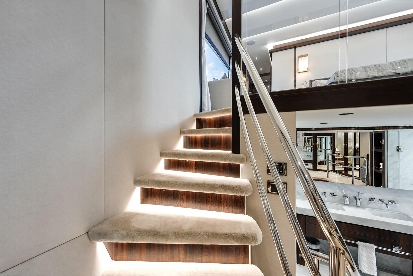 a flight of stairs leading to a building aboard TRIGGER HAPPY Yacht for Sale
