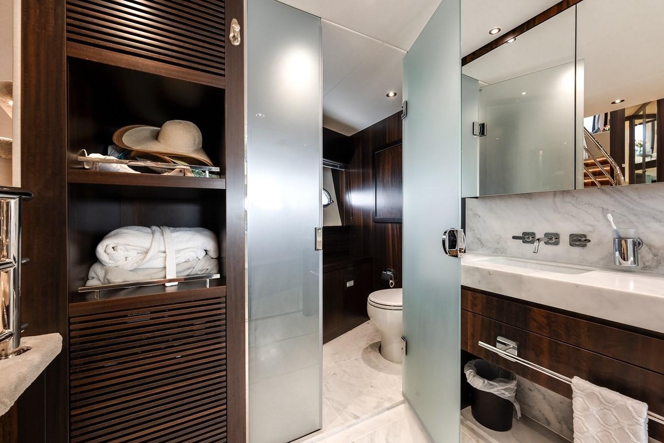 a bathroom with a large shower unit aboard TRIGGER HAPPY Yacht for Sale