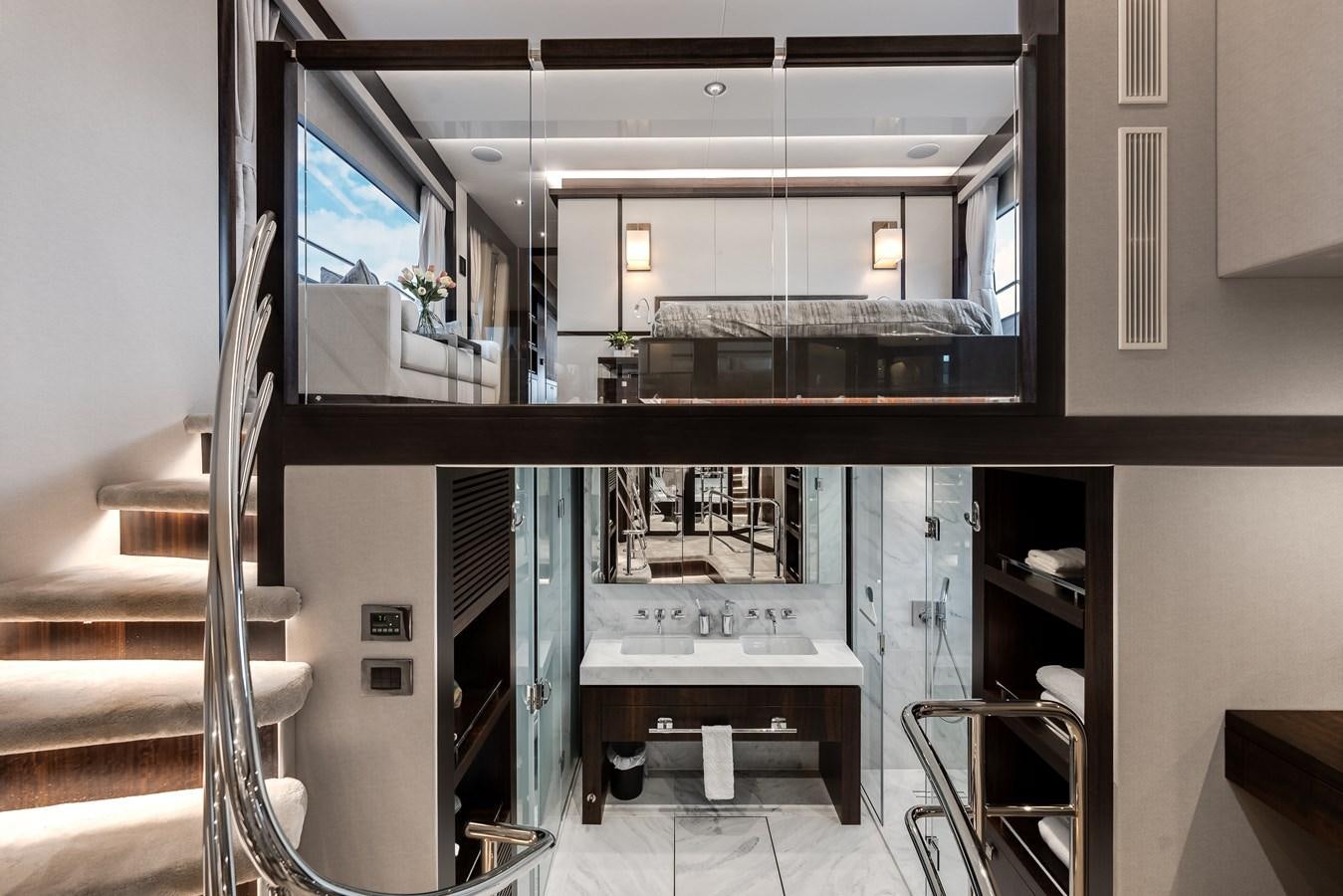 a room with a desk and a window aboard TRIGGER HAPPY Yacht for Sale