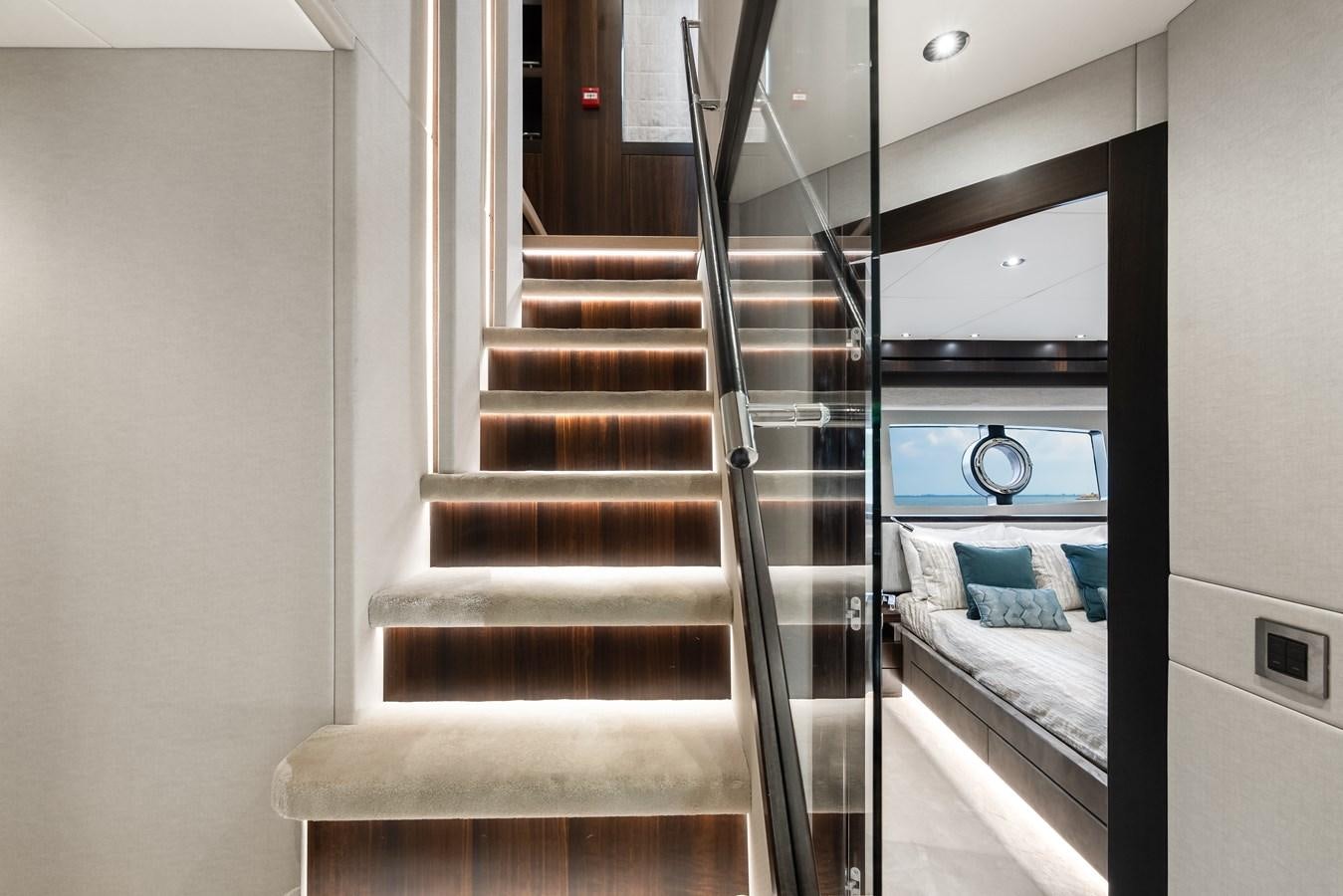 a set of stairs in a room aboard TRIGGER HAPPY Yacht for Sale