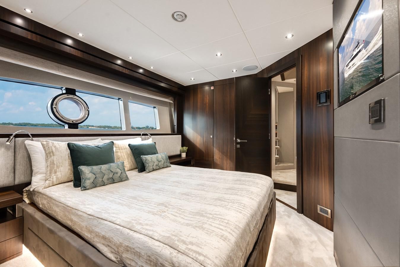 a bed in a room aboard TRIGGER HAPPY Yacht for Sale