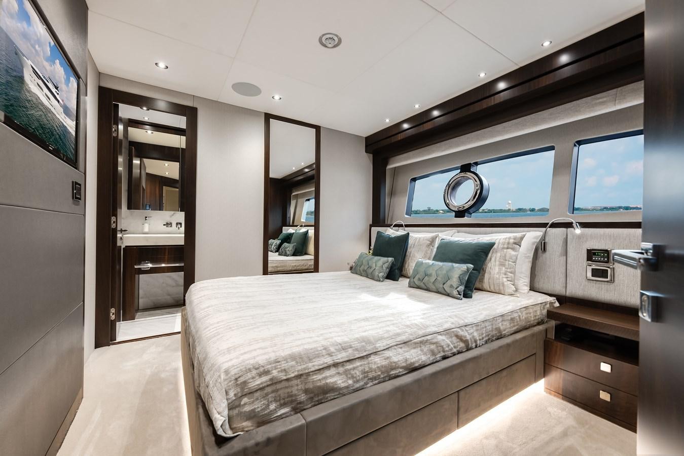 a bed in a room aboard TRIGGER HAPPY Yacht for Sale