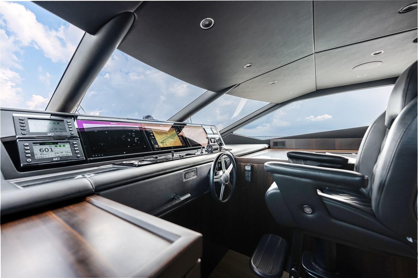 the interior of a car aboard TRIGGER HAPPY Yacht for Sale