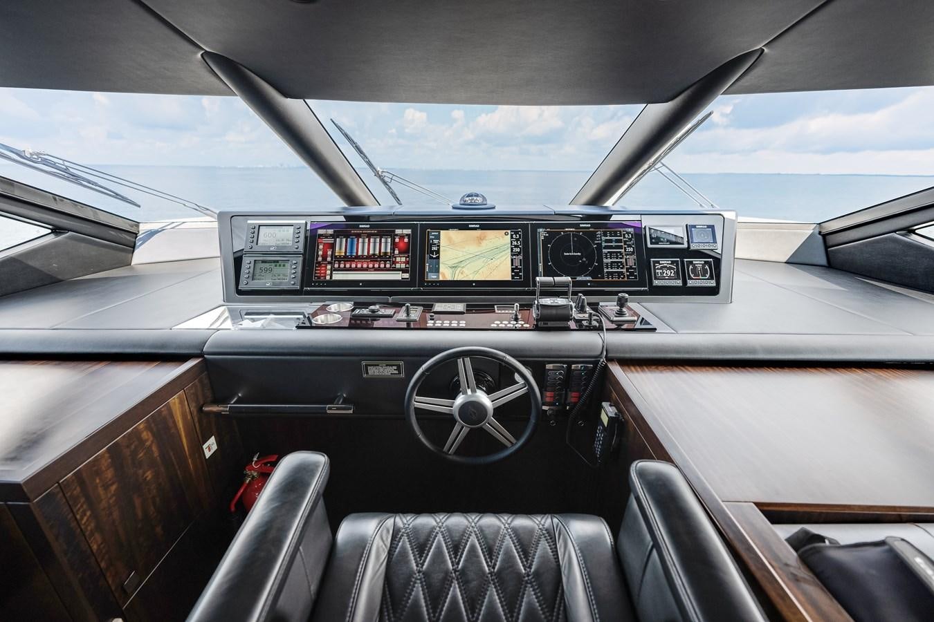 inside of a car aboard TRIGGER HAPPY Yacht for Sale
