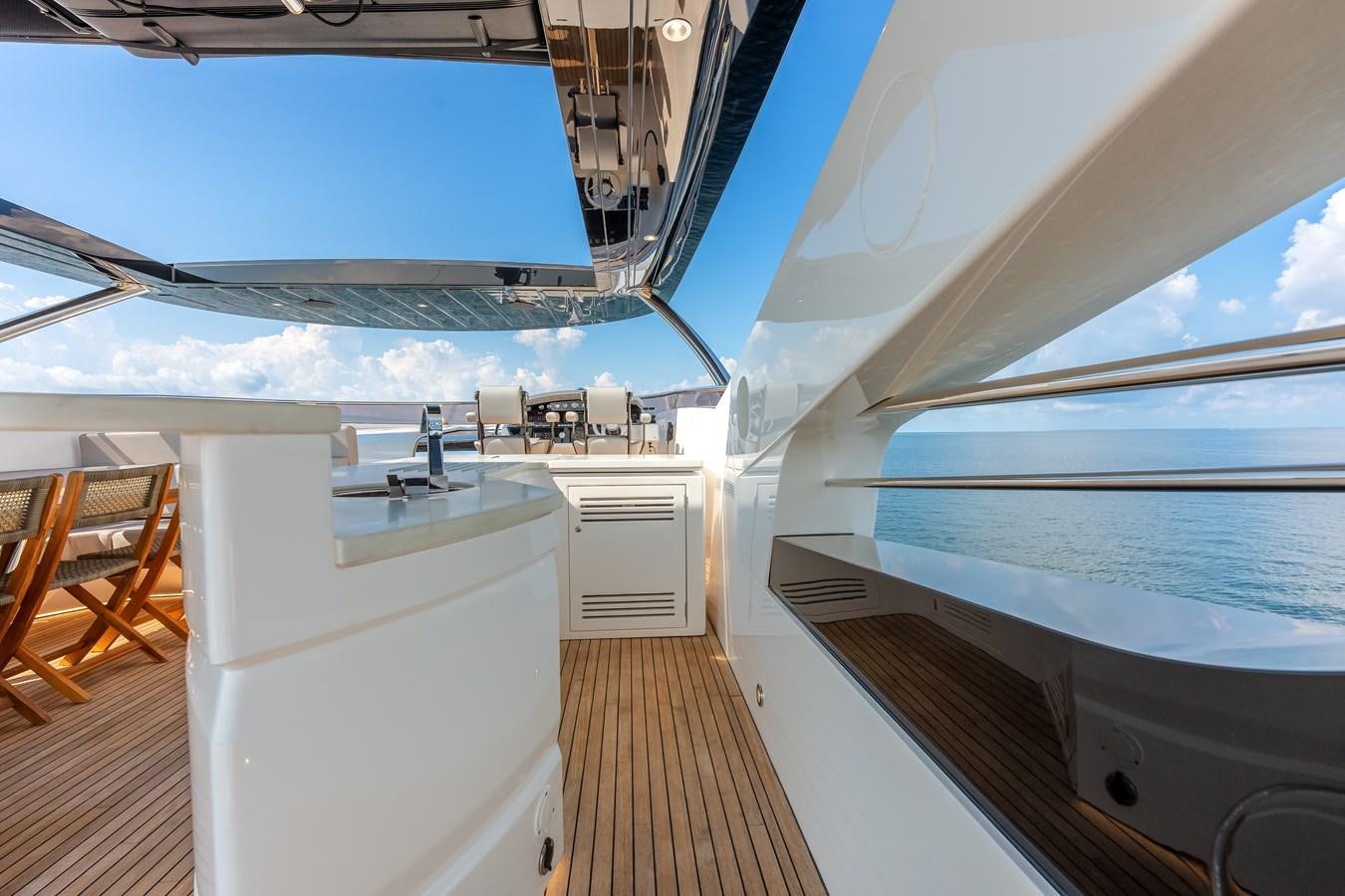 a large room with a large window aboard TRIGGER HAPPY Yacht for Sale