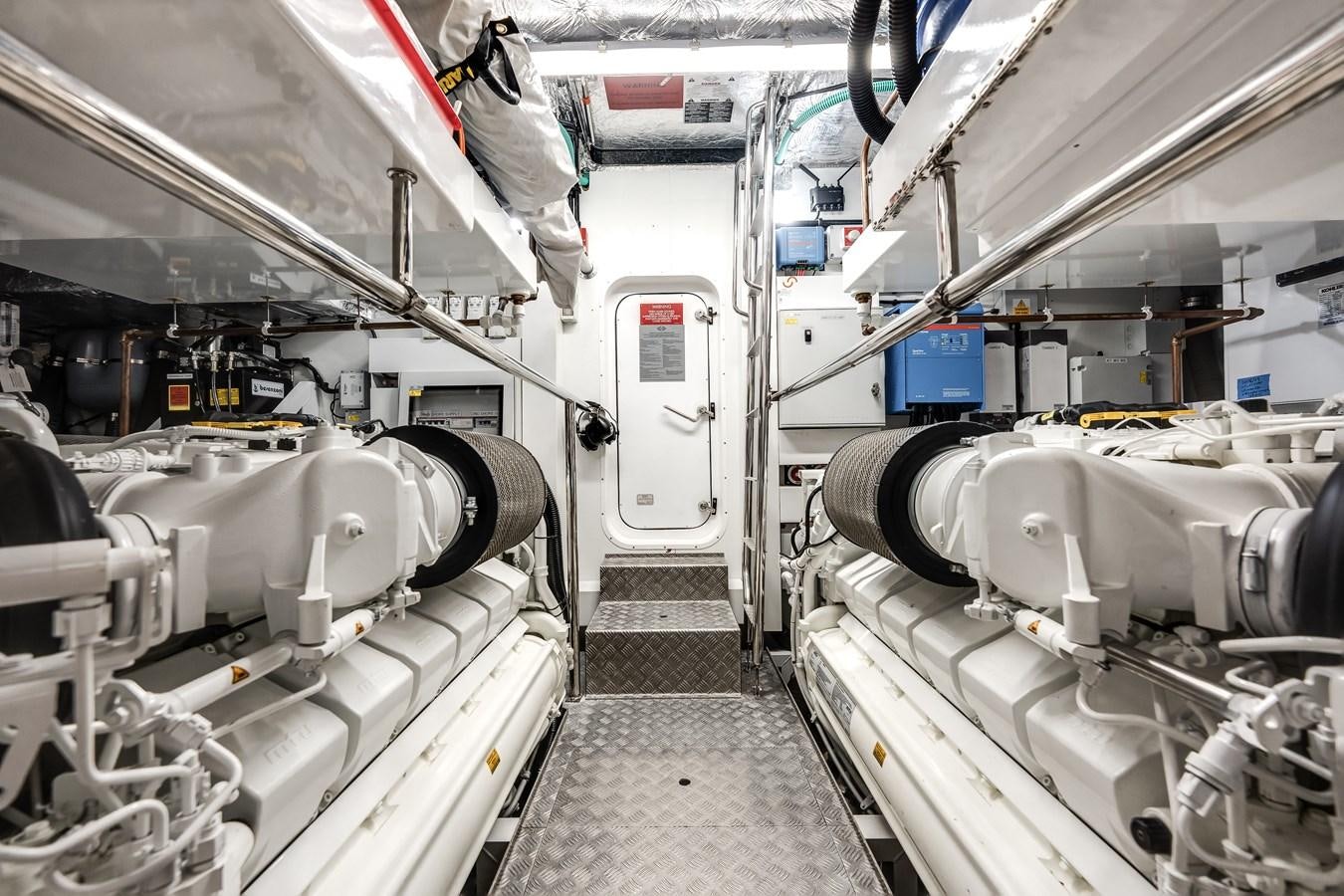 a room with machinery aboard TRIGGER HAPPY Yacht for Sale