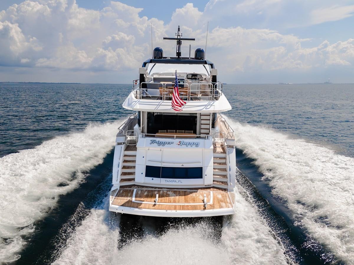 a boat on the water aboard TRIGGER HAPPY Yacht for Sale