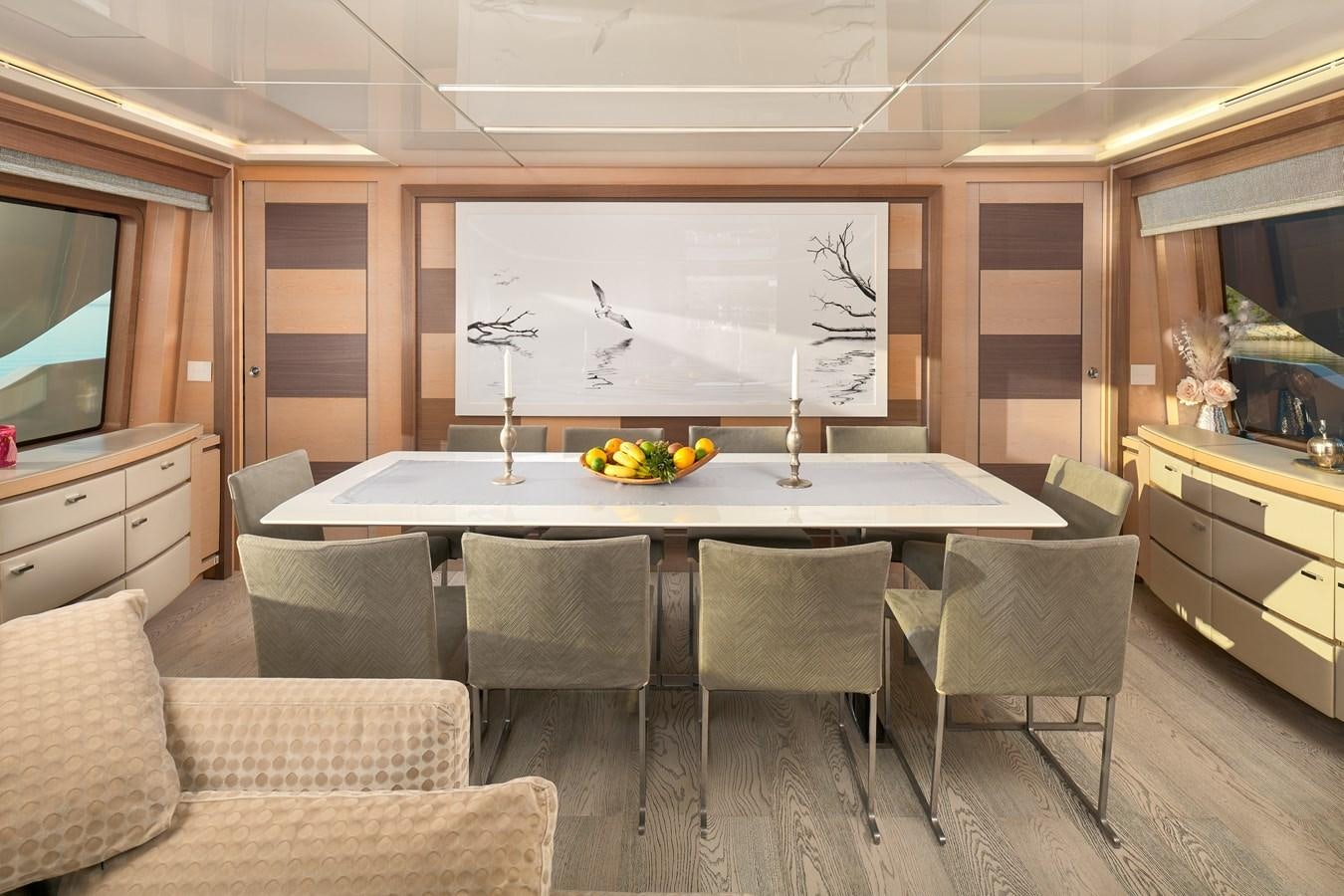 a large kitchen with a table and chairs aboard OCEAN DRIVE Yacht for Sale
