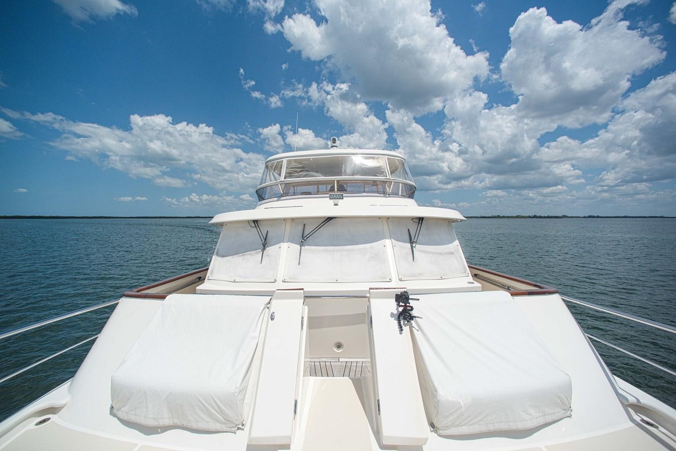 a white boat on the water aboard TRUE NORTH Yacht for Sale