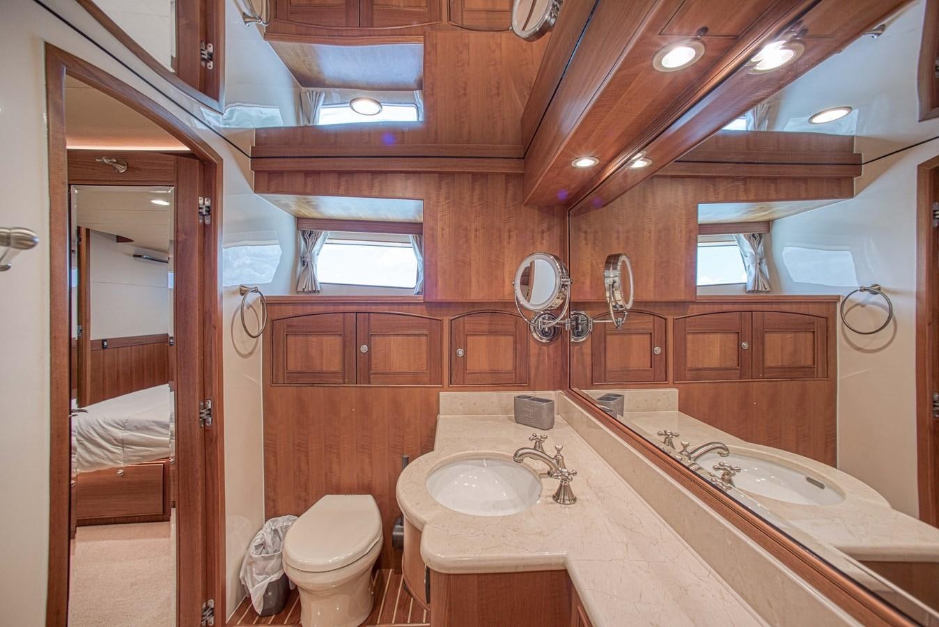 a bathroom with a large tub and sink aboard TRUE NORTH Yacht for Sale