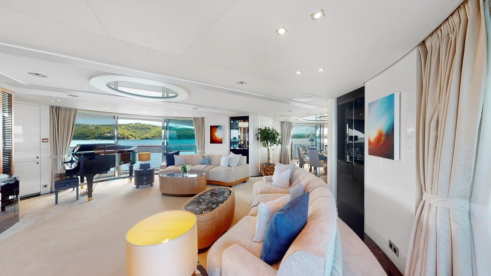 a living room with a large window aboard AFTER YOU Yacht for Sale