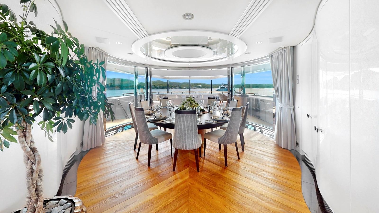 a dining table in a room aboard AFTER YOU Yacht for Sale
