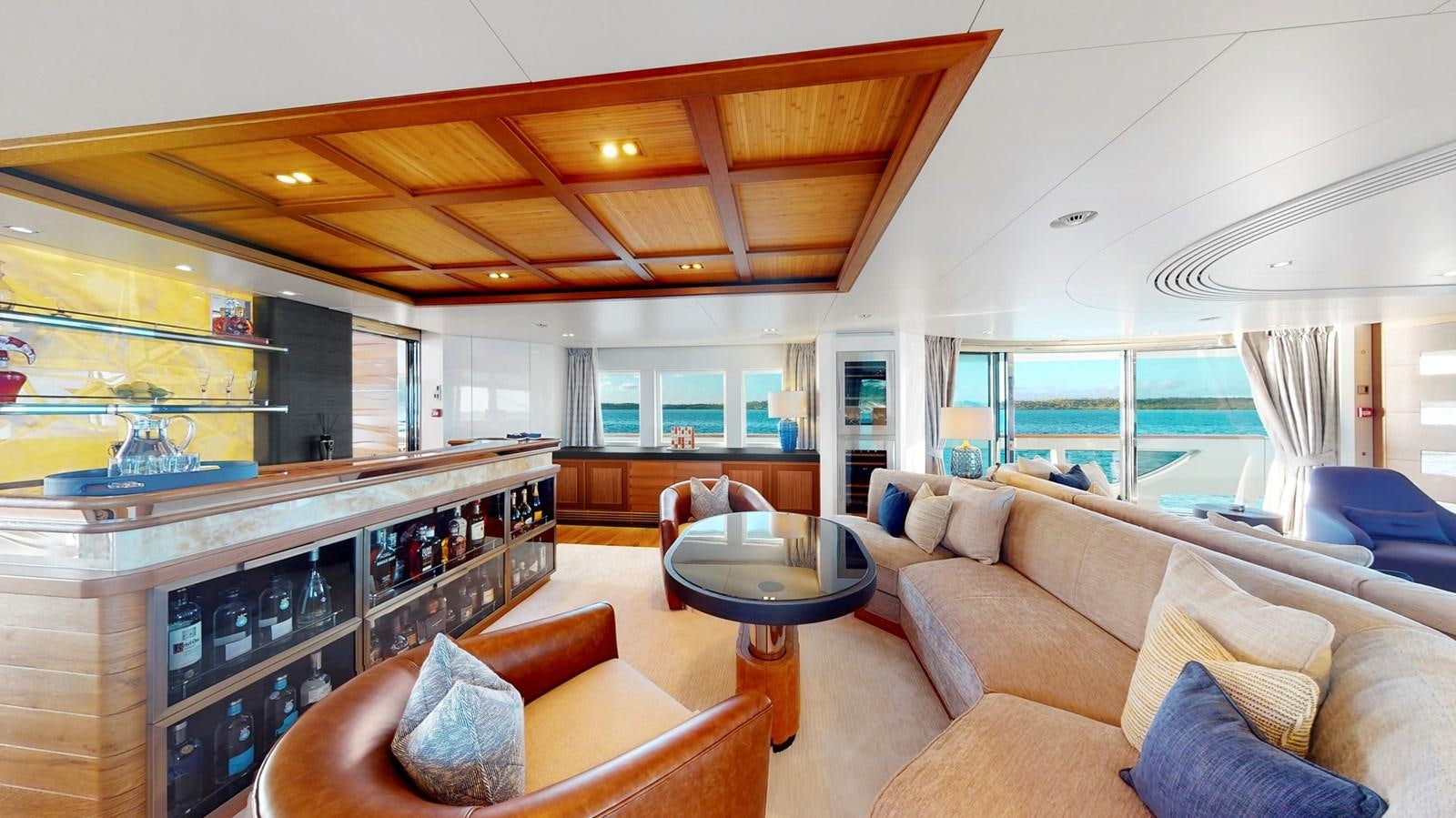 a living room with a large window aboard AFTER YOU Yacht for Sale