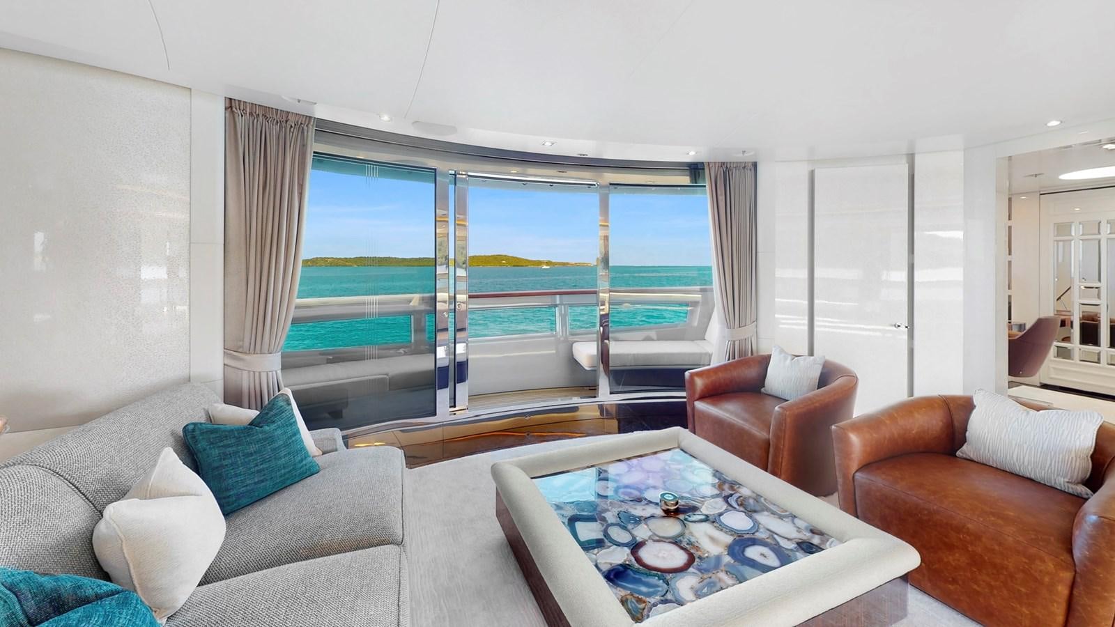 a living room with a large window aboard AFTER YOU Yacht for Sale