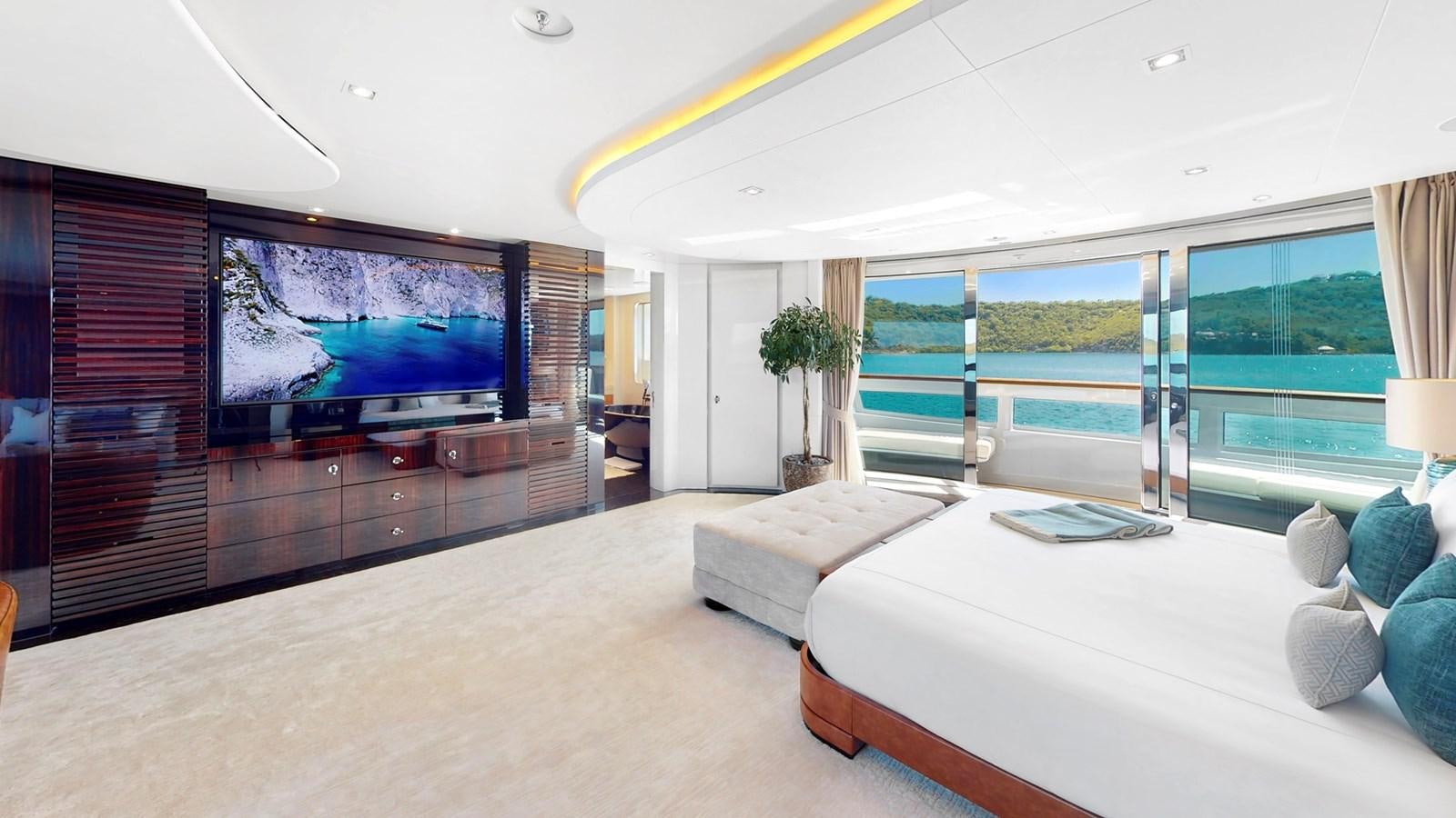 a large living room with a large screen aboard AFTER YOU Yacht for Sale