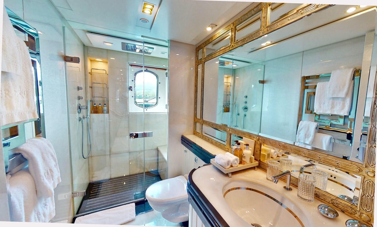 a bathroom with a glass shower aboard AFTER YOU Yacht for Sale
