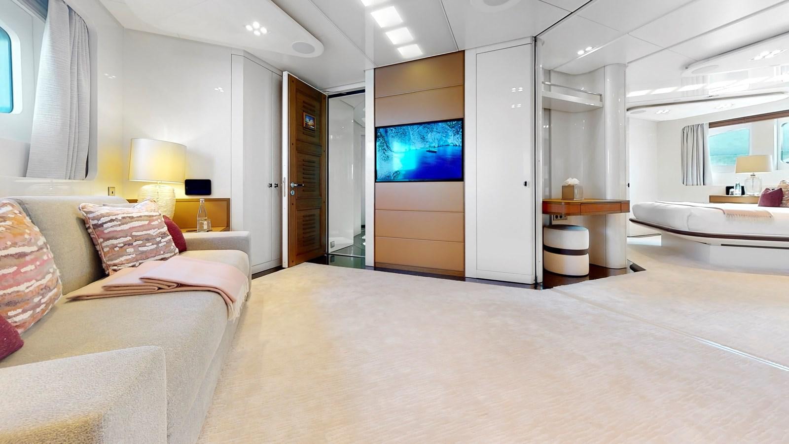 a room with a bed and a tv aboard AFTER YOU Yacht for Sale