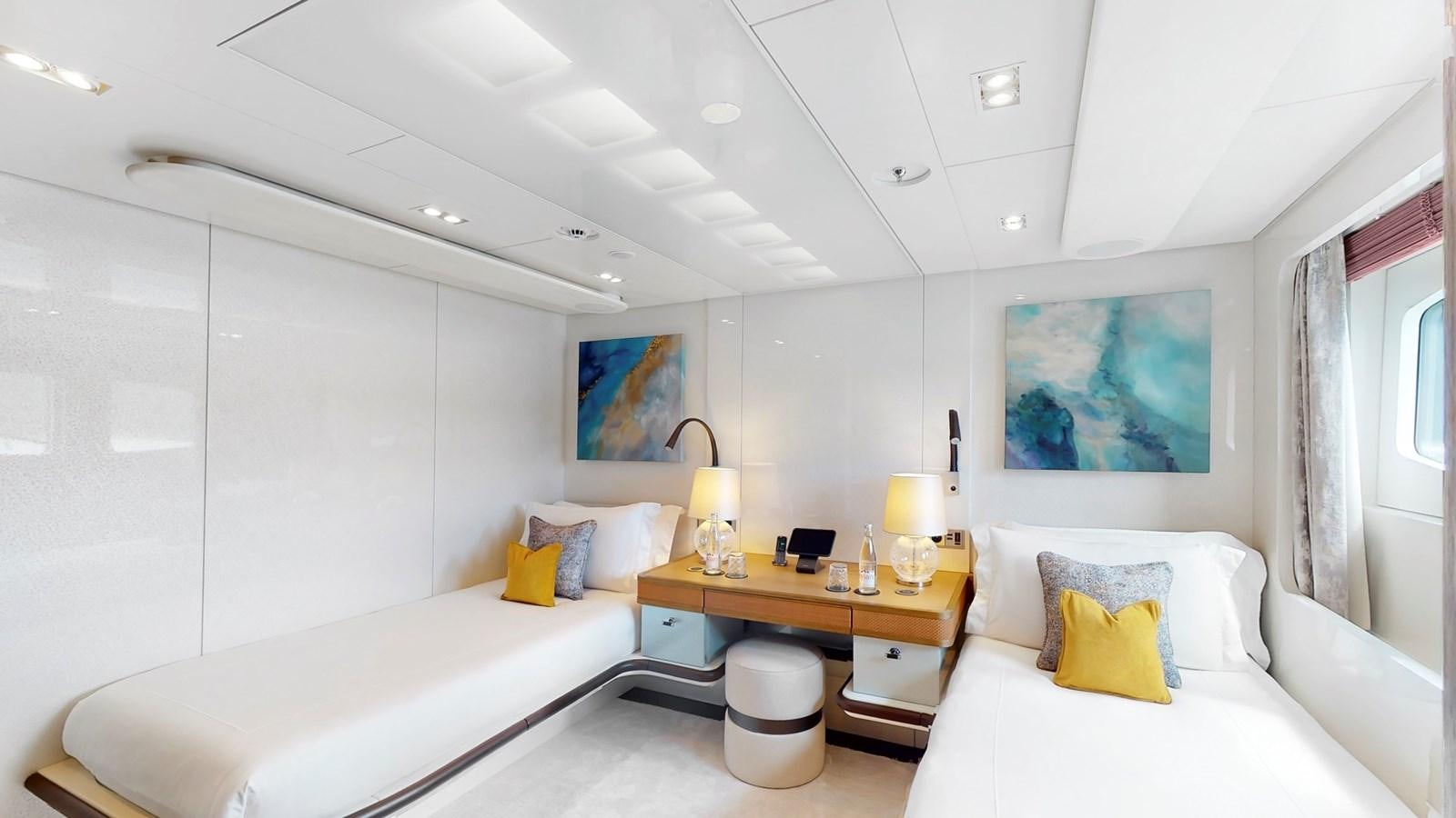 a room with two beds aboard AFTER YOU Yacht for Sale