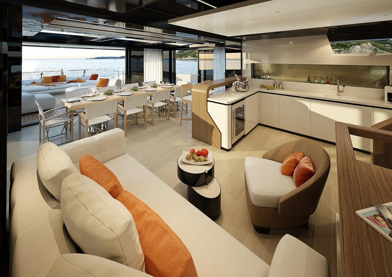 a room with tables chairs and a counter with food on it aboard TRIBALE YACHTS Yacht for Sale