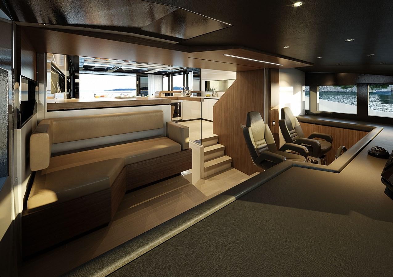 a room with a couch and a tv on the wall aboard TRIBALE YACHTS Yacht for Sale