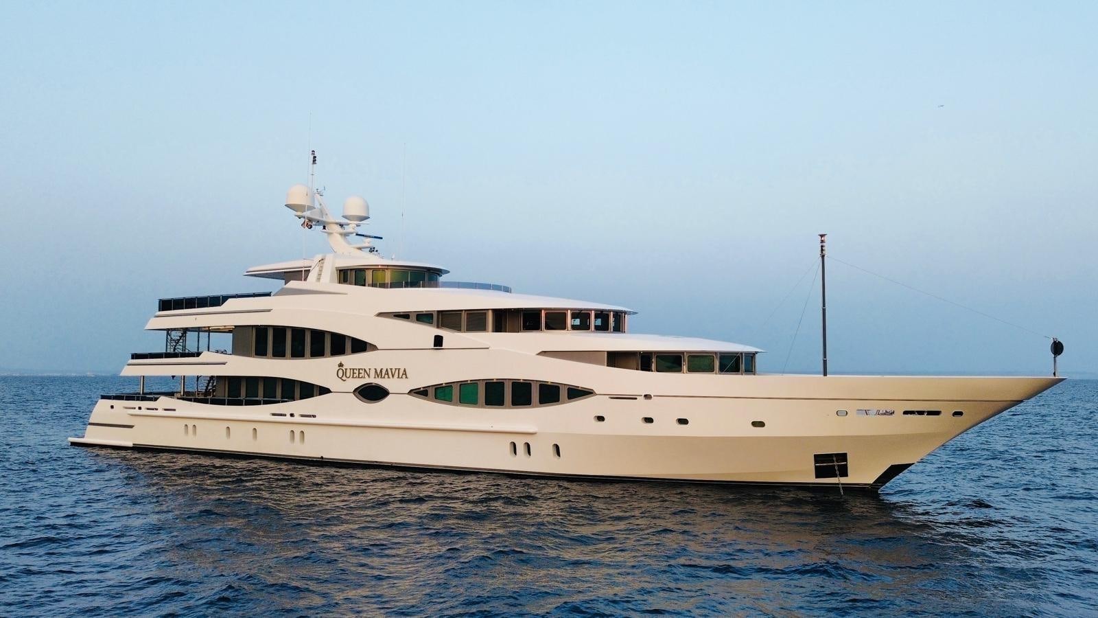 a large white boat aboard QUEEN MAVIA Yacht for Sale