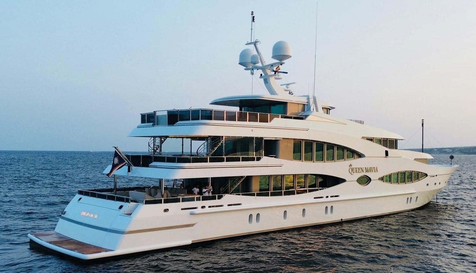 a large white boat with a drone on top of it aboard QUEEN MAVIA Yacht for Sale