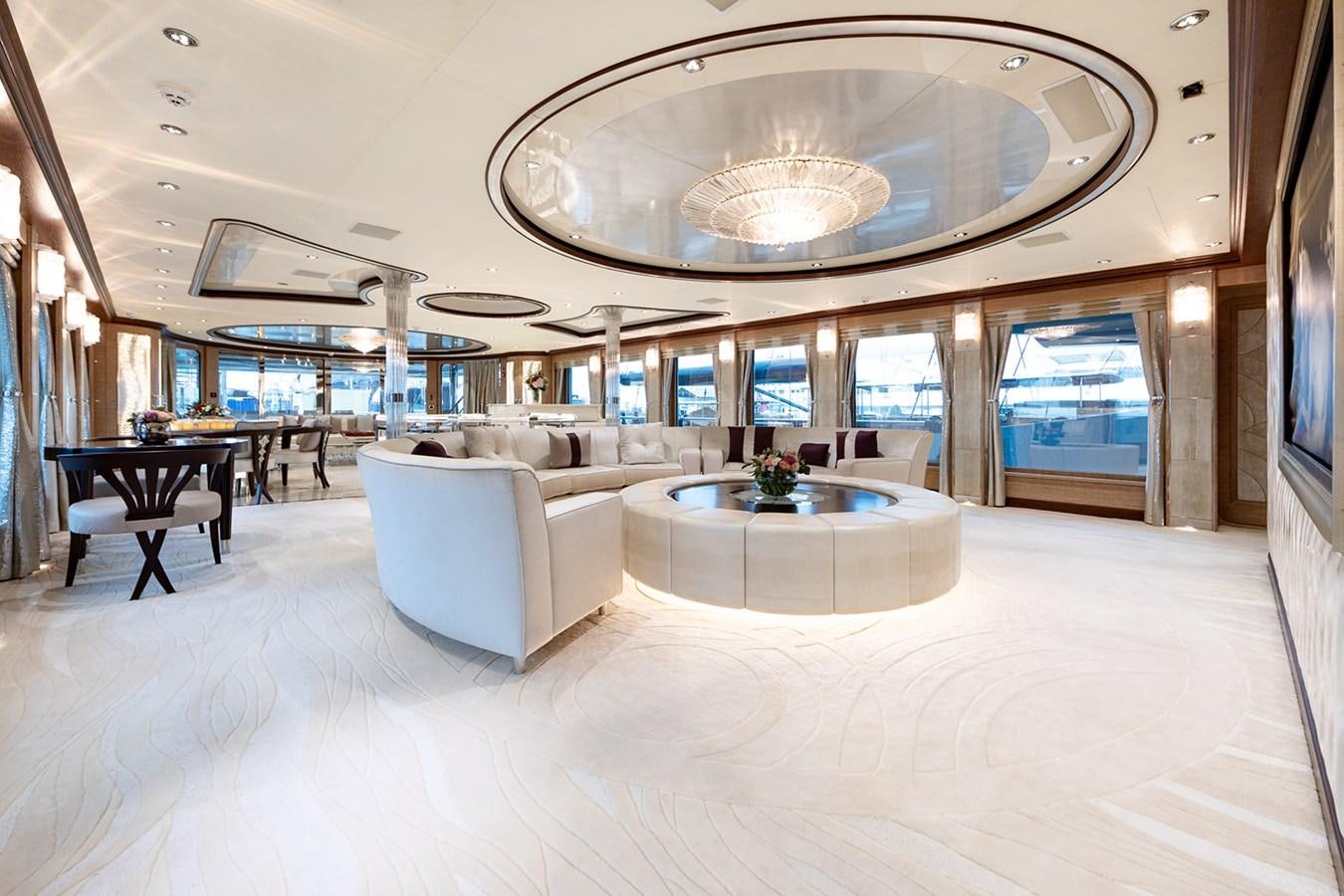 a large room with a large chandelier aboard QUEEN MAVIA Yacht for Sale