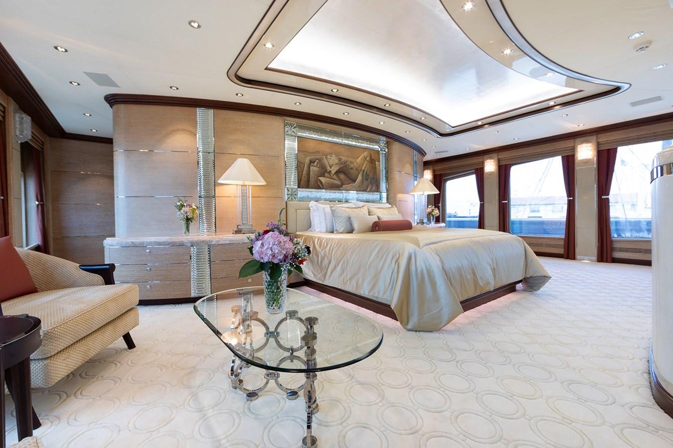 a large bedroom with a large bed aboard QUEEN MAVIA Yacht for Sale