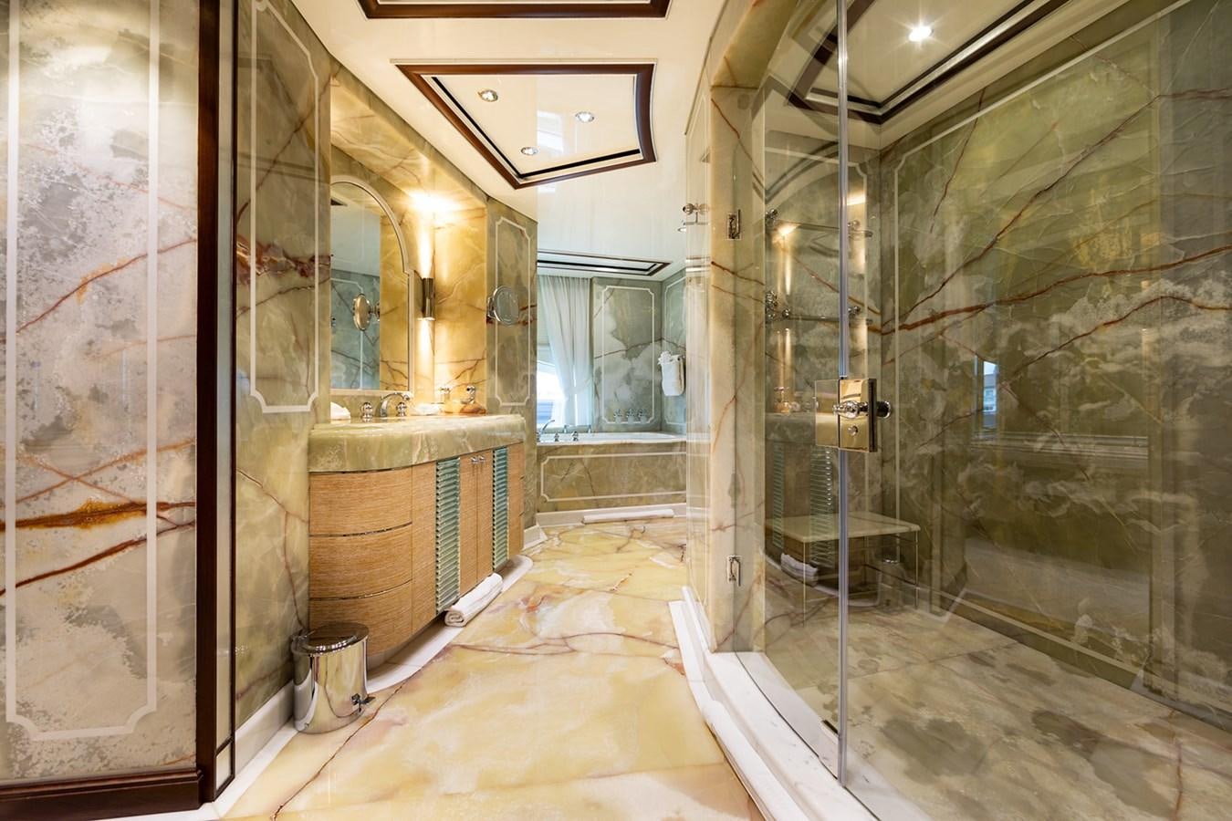 a bathroom with a shower and a sink aboard QUEEN MAVIA Yacht for Sale