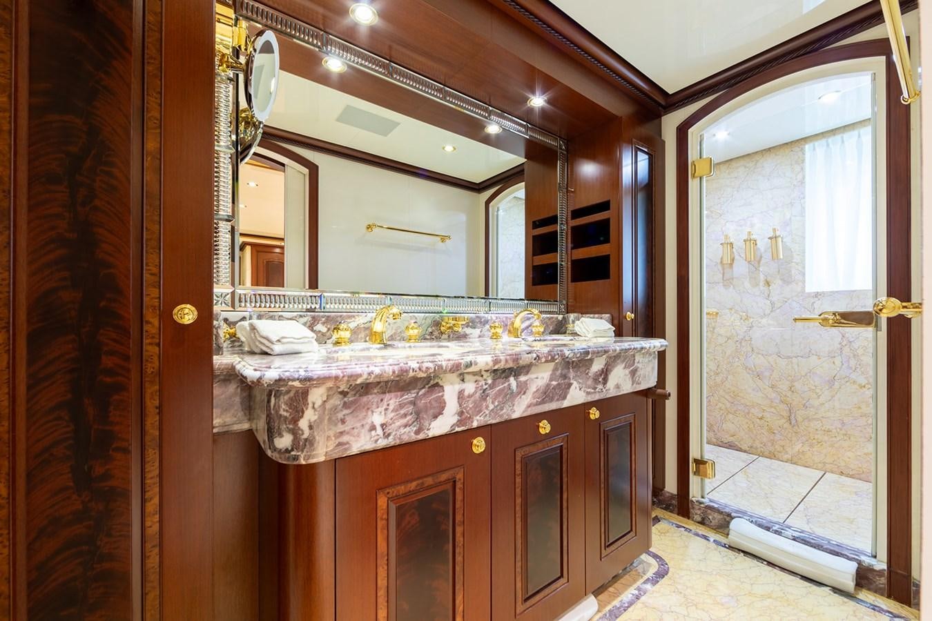 a bathroom with a marble counter top aboard QUEEN MAVIA Yacht for Sale