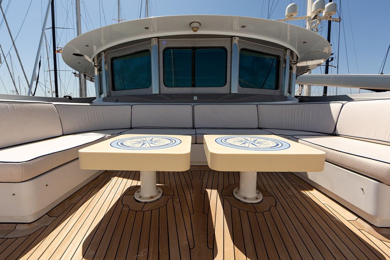 a boat on a deck aboard QUEEN MAVIA Yacht for Sale