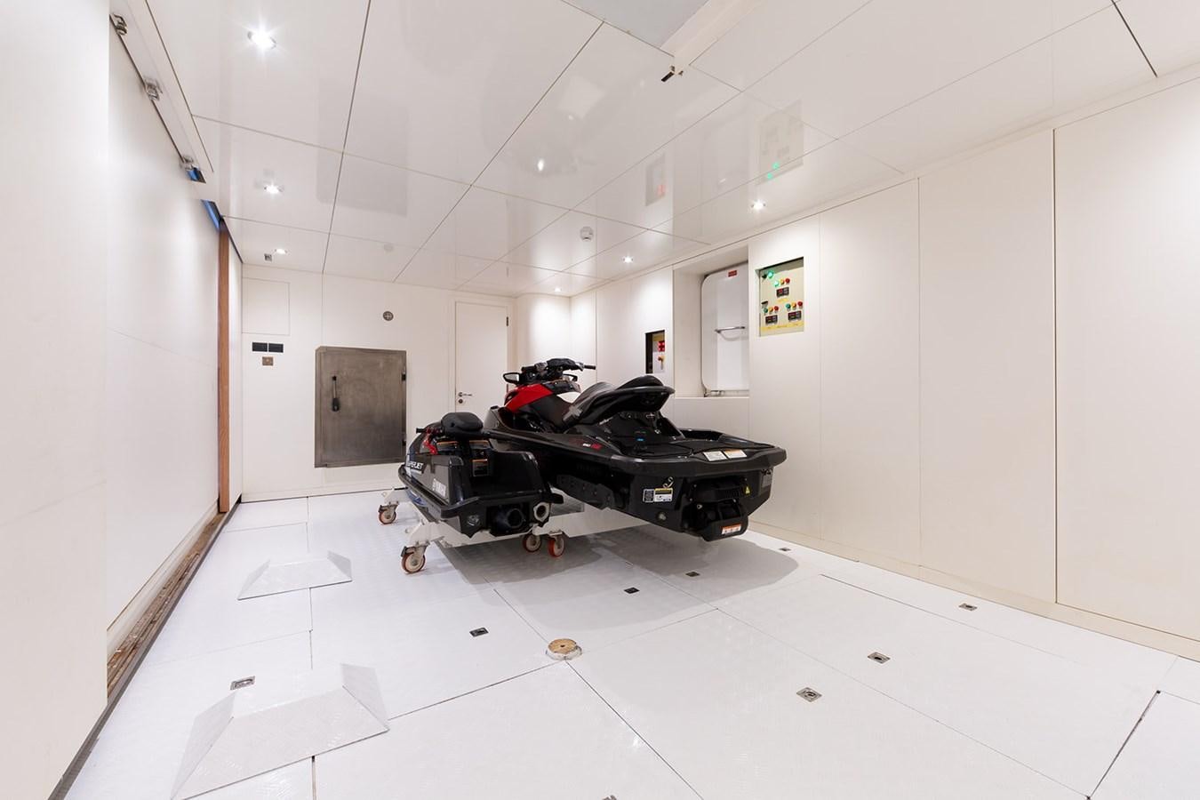 a black cart in a room aboard QUEEN MAVIA Yacht for Sale