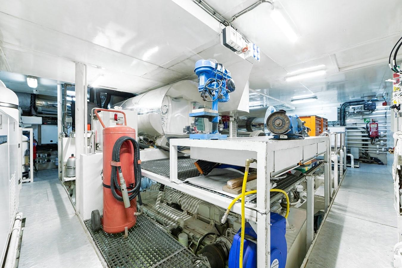 a room with machinery and pipes aboard QUEEN MAVIA Yacht for Sale